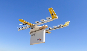 drone che trasporta pacco fedex